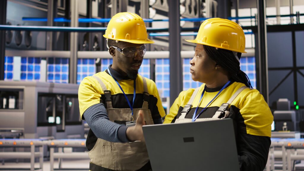 solar panels factory team working together to fix gear